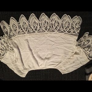 White off the shoulder shirt.